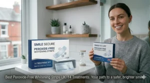 A clean product illustration of a UK-compliant peroxide-free whitening strips kit containing 14 individual treatments.