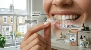 Close-up demonstration of a whitening strip being used to remove stubborn tea and coffee stains from front teeth.