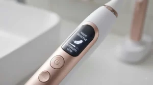 LED display panel on an electric toothbrush handle highlighting the dedicated sensitive cleaning mode.